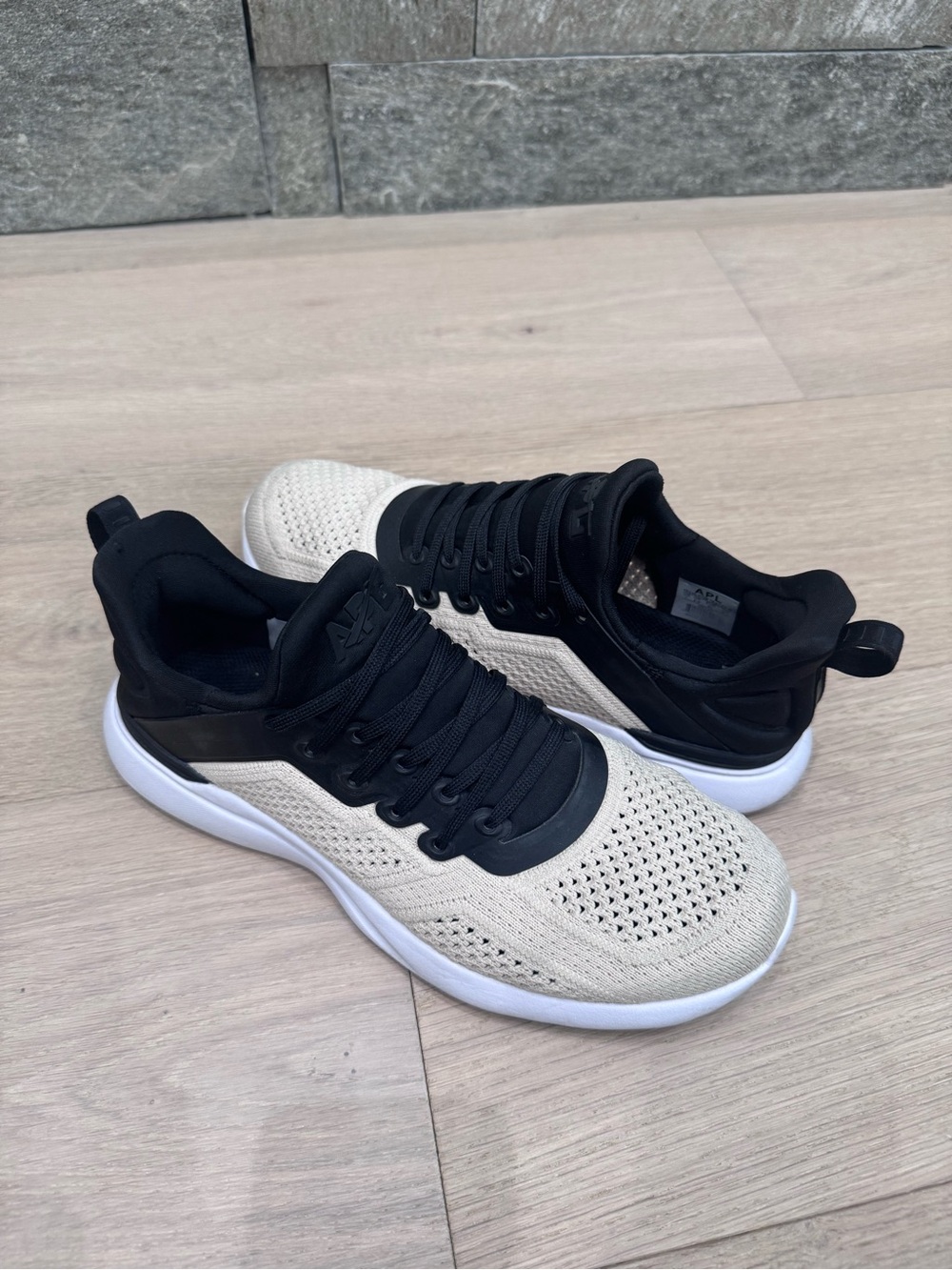 APL Two-Tone Knit Sneakers in Black and Cream